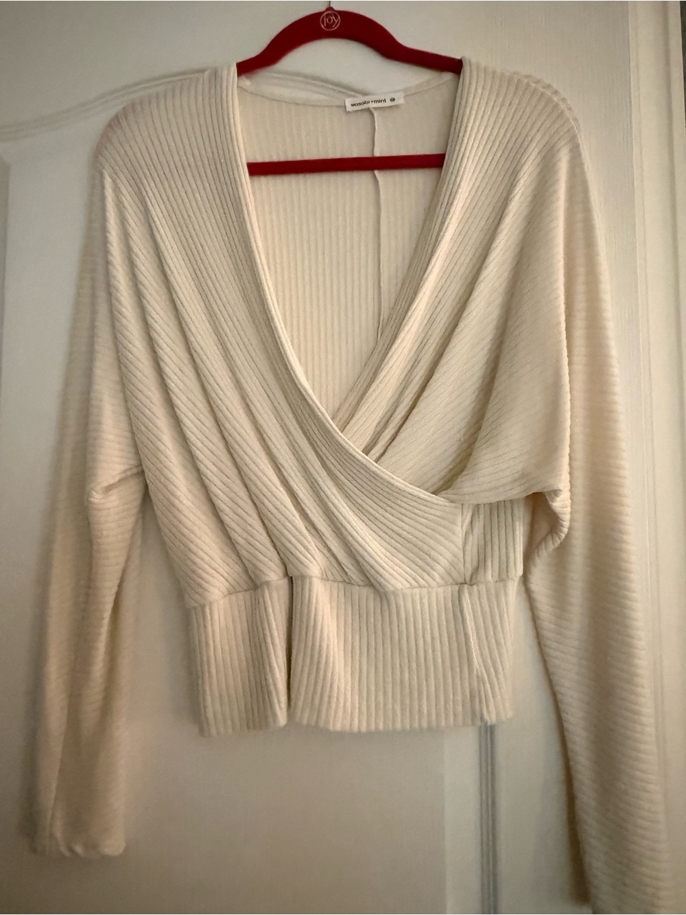 Surplice Rib-Knit V-Neck Sweater in Cream